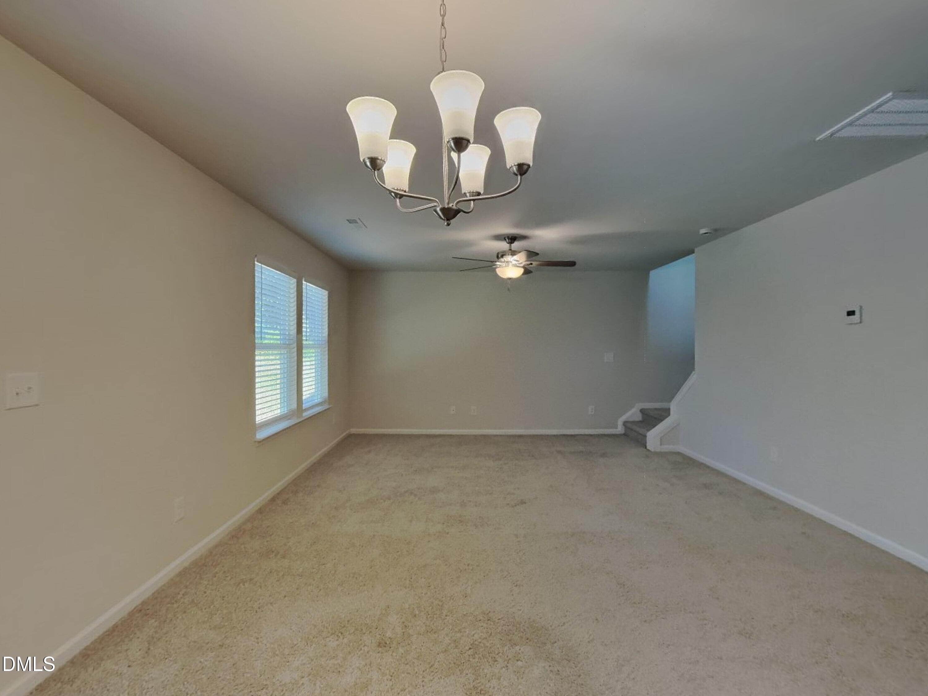 35 Drake Circle Bunnlevel, NC 28323 - Photo 2 of 17 a view of livingroom with chandelier