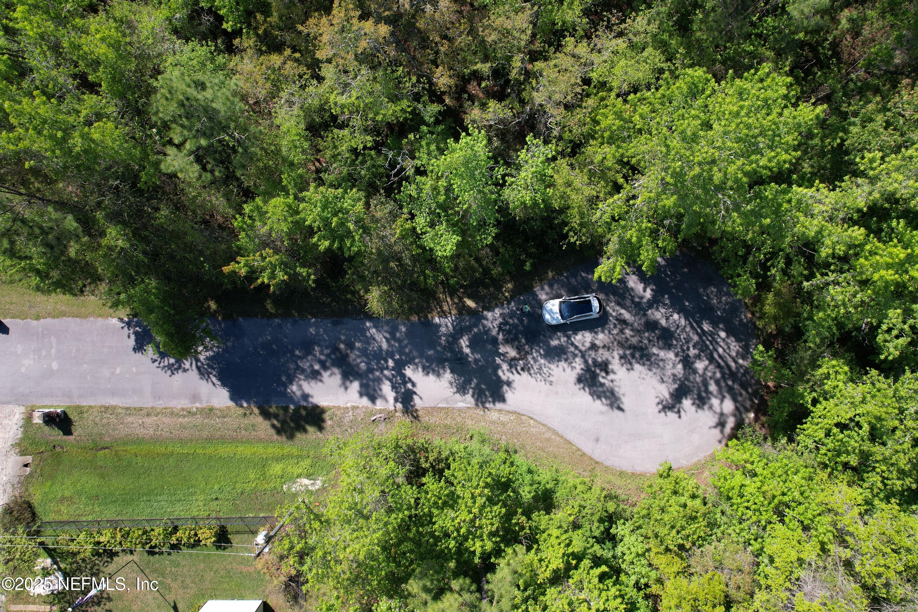 0 Cedar Creek Road Green Cove Springs, FL 32043 - Photo 7 of 10 an aerial view of a house with a yard