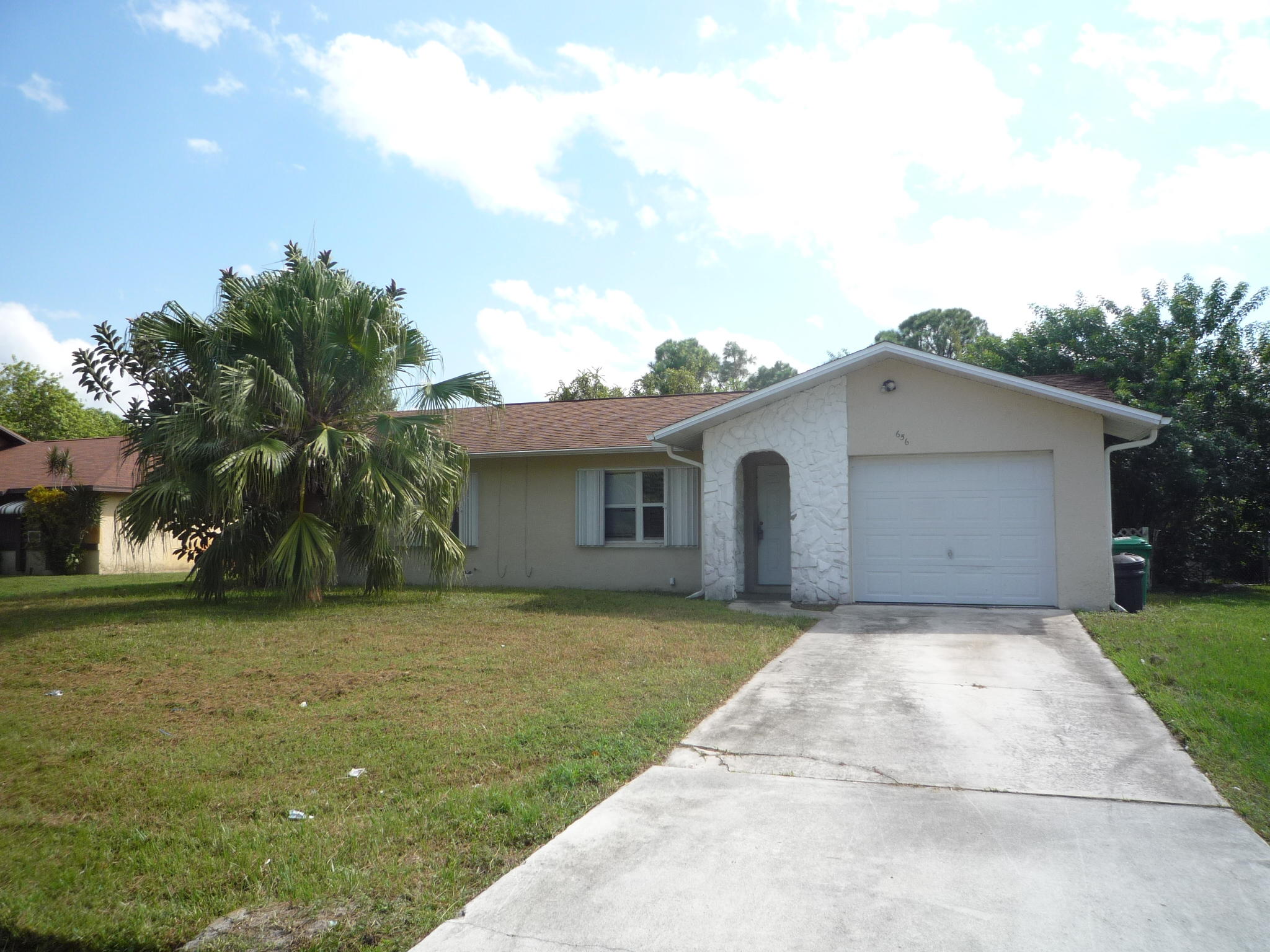 656 Northwest Riverside Drive Port St. Lucie, FL 34983 - Photo 1 of 35 Front