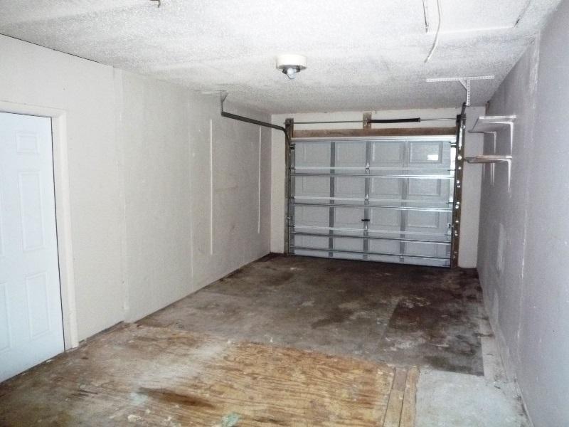 656 Northwest Riverside Drive Port St. Lucie, FL 34983 - Photo 14 of 35 Garage