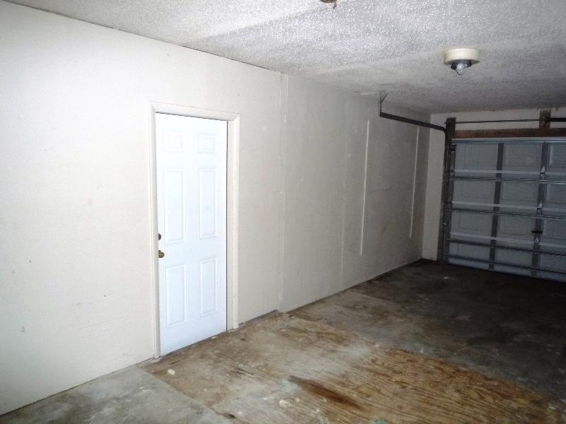 656 Northwest Riverside Drive Port St. Lucie, FL 34983 - Photo 15 of 35 Garage