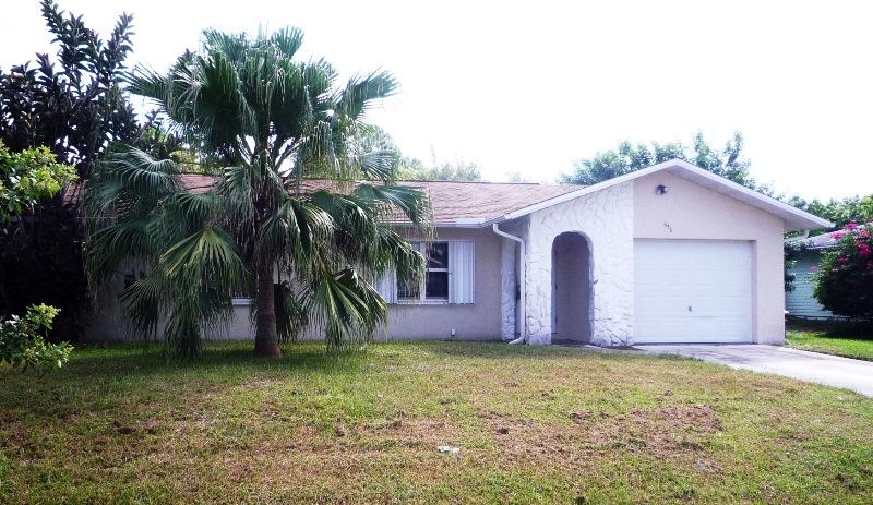 656 Northwest Riverside Drive Port St. Lucie, FL 34983 - Photo 2 of 35 Front