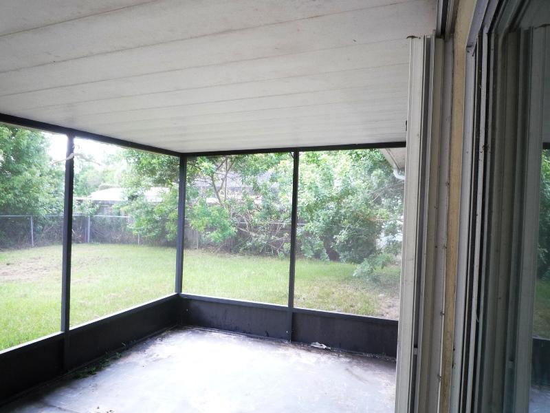 656 Northwest Riverside Drive Port St. Lucie, FL 34983 - Photo 25 of 35 Screened Patio