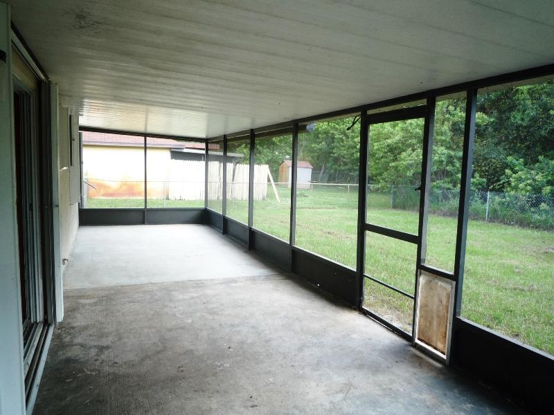 656 Northwest Riverside Drive Port St. Lucie, FL 34983 - Photo 26 of 35 Screened Patio