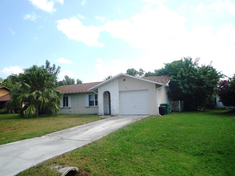 656 Northwest Riverside Drive Port St. Lucie, FL 34983 - Photo 3 of 35 Front