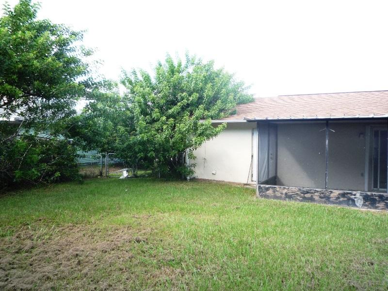 656 Northwest Riverside Drive Port St. Lucie, FL 34983 - Photo 32 of 35 Back View