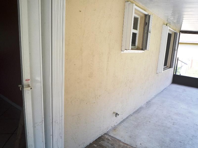 656 Northwest Riverside Drive Port St. Lucie, FL 34983 - Photo 35 of 35 Shutters Back Patio