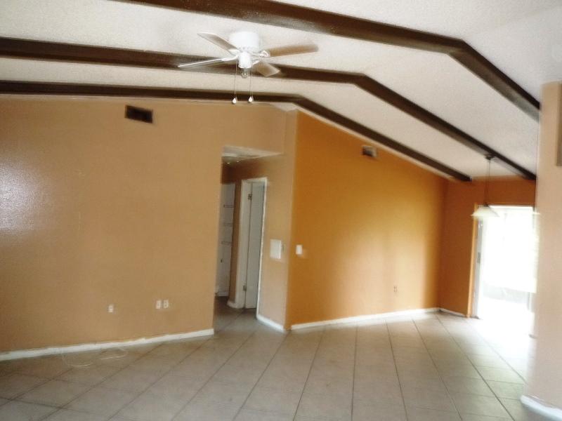 656 Northwest Riverside Drive Port St. Lucie, FL 34983 - Photo 6 of 35 Living Room Dining Area