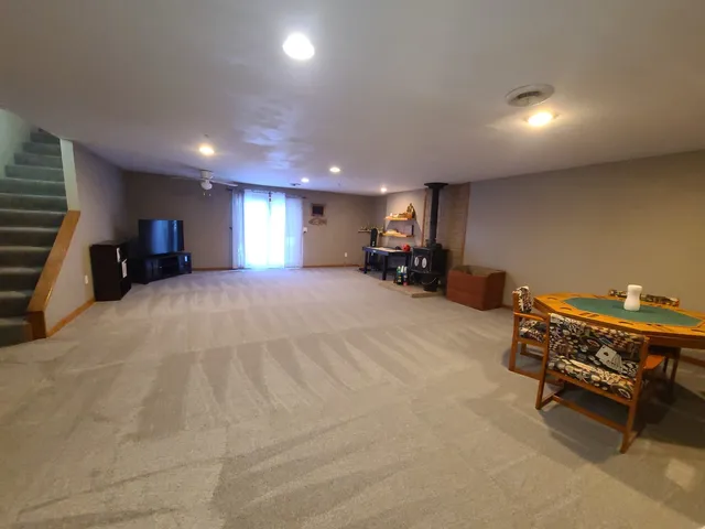 a view of a room with furniture