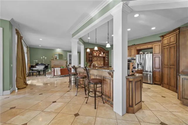 $975,000 | 609 Northeast Lake Point Drive, Lee's Summit, MO 64064