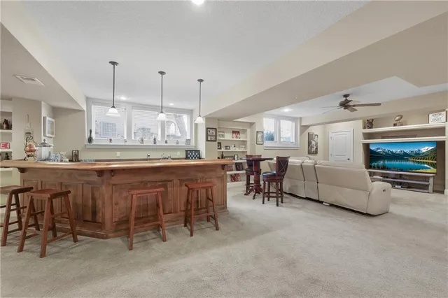 $975,000 | 609 Northeast Lake Point Drive, Lee's Summit, MO 64064