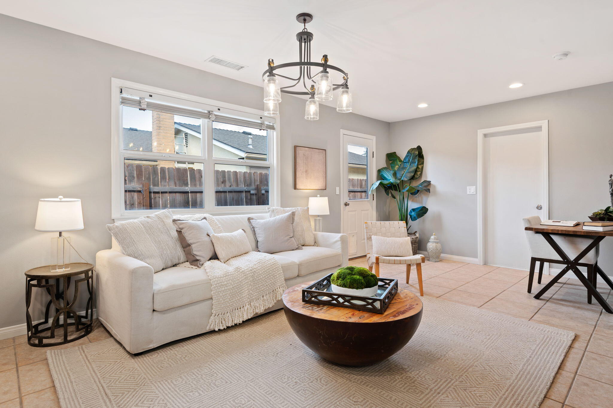 232 2nd Street Buellton, CA 93427 - Photo 13 of 29 a living room with furniture and a chandelier