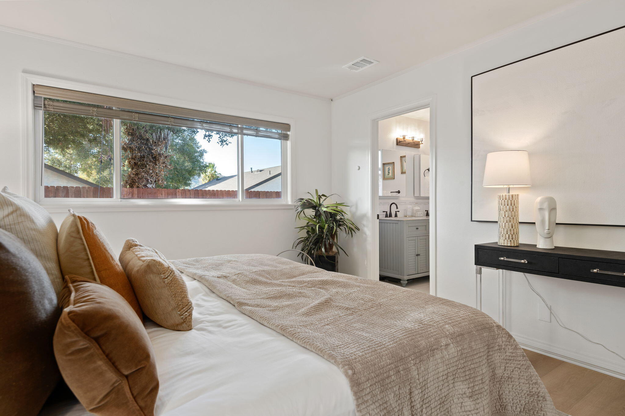 232 2nd Street Buellton, CA 93427 - Photo 23 of 29 a bedroom with a bed and a large window