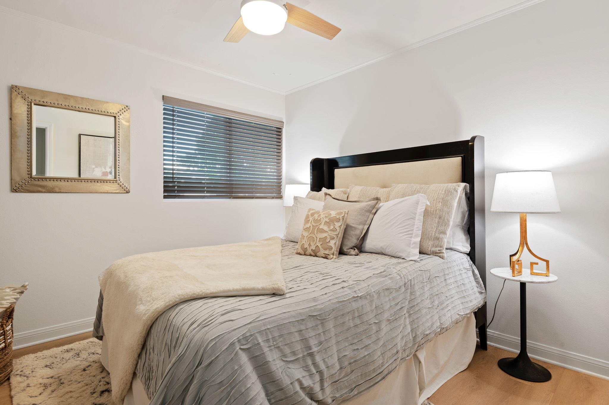 232 2nd Street Buellton, CA 93427 - Photo 28 of 29 a bedroom with a bed and a lamp