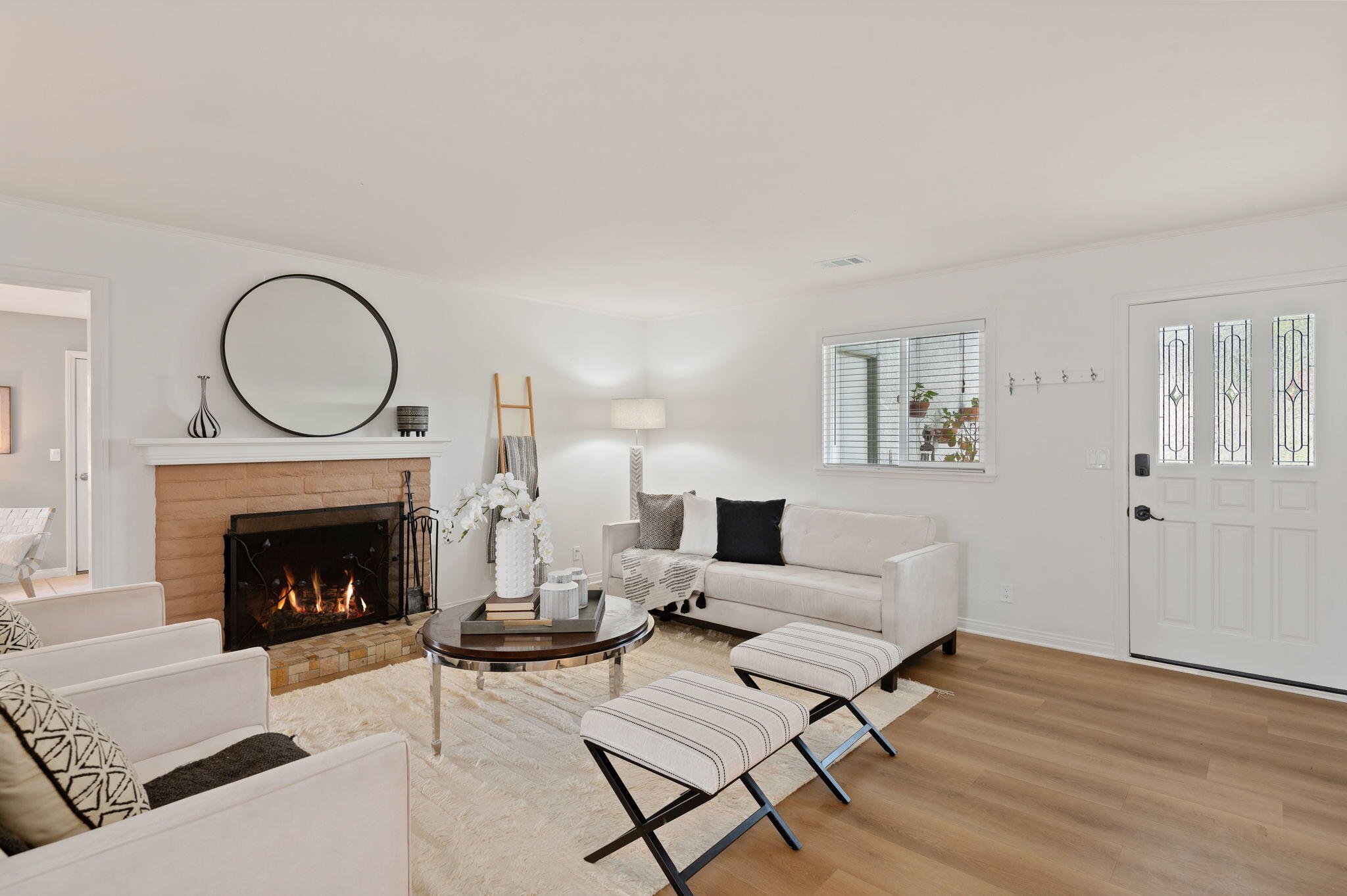 232 2nd Street Buellton, CA 93427 - Photo 6 of 29 a living room with furniture a fireplace and a potted plant