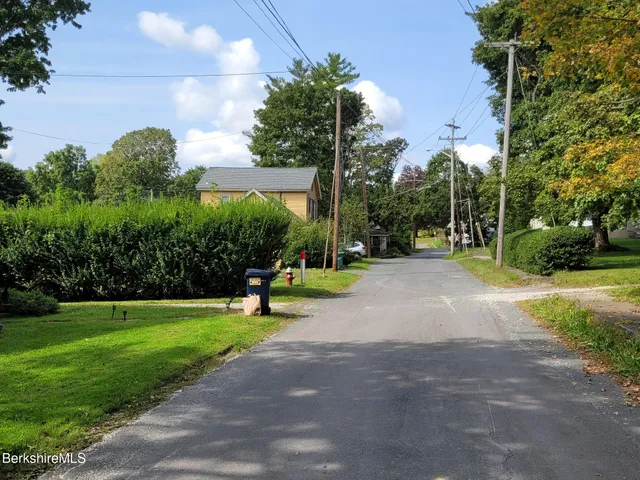a view of a park with tree s