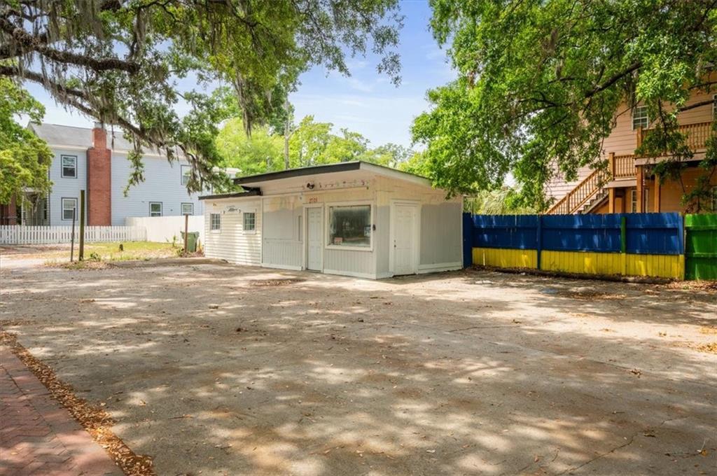 2705 Martin Luther King Jr Boulevard Savannah, GA 31405 - Photo 6 of 11 a view of a house with a big yard and large tree