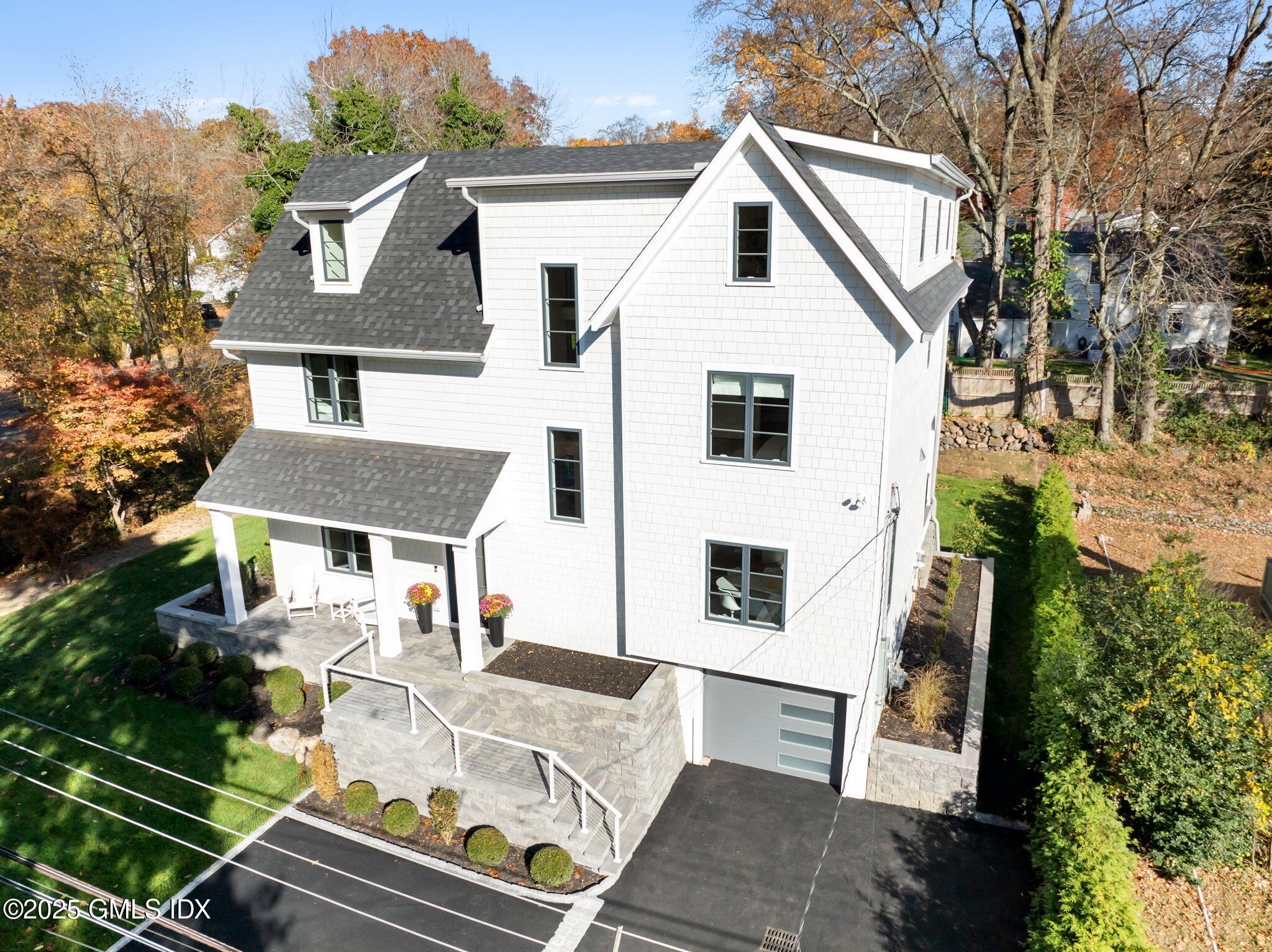 44 Amherst Road Old Greenwich, CT 06870 - Photo 2 of 39 a view of house with outdoor space