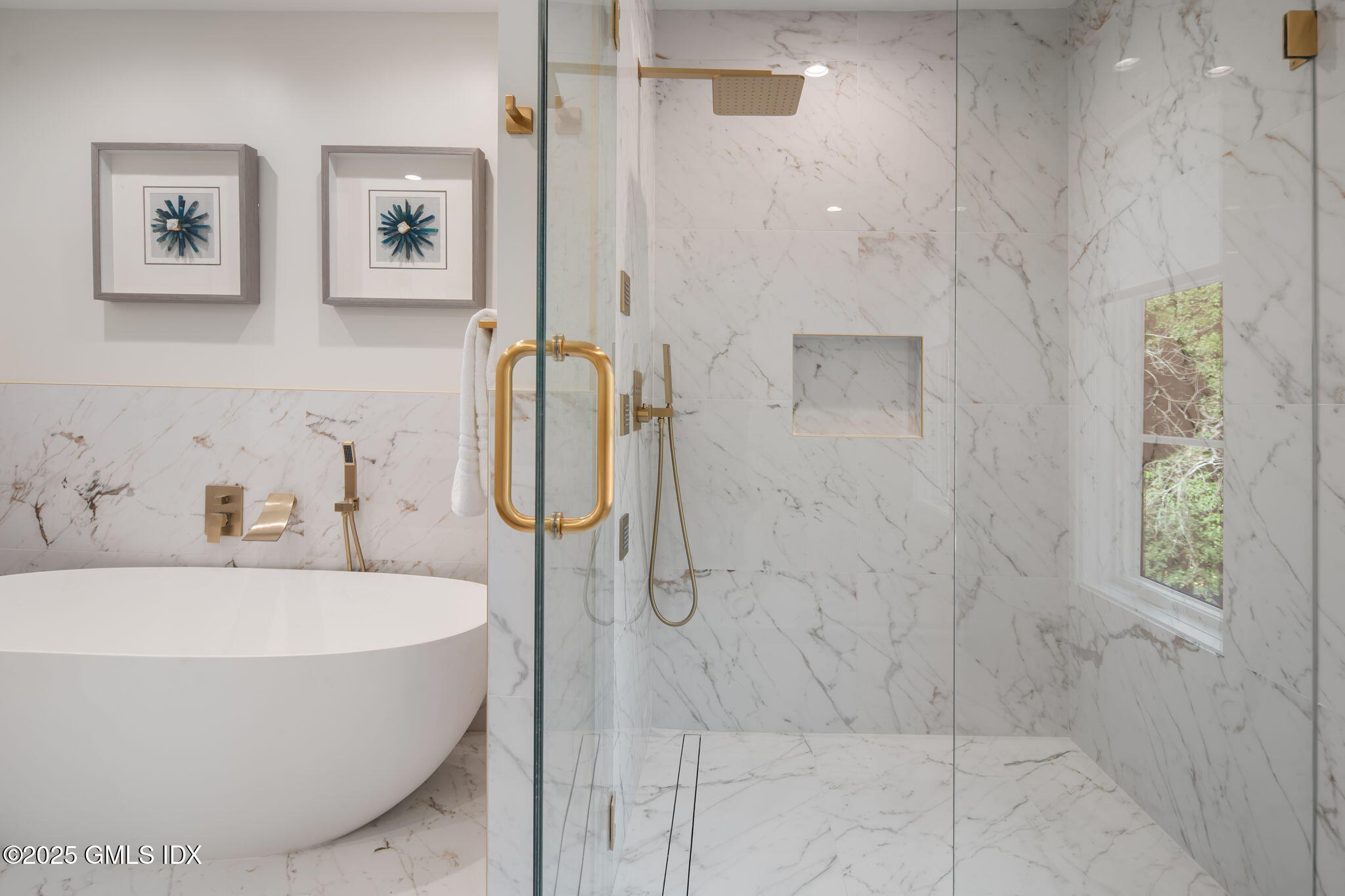 44 Amherst Road Old Greenwich, CT 06870 - Photo 27 of 39 a bathroom with a bathtub and shower