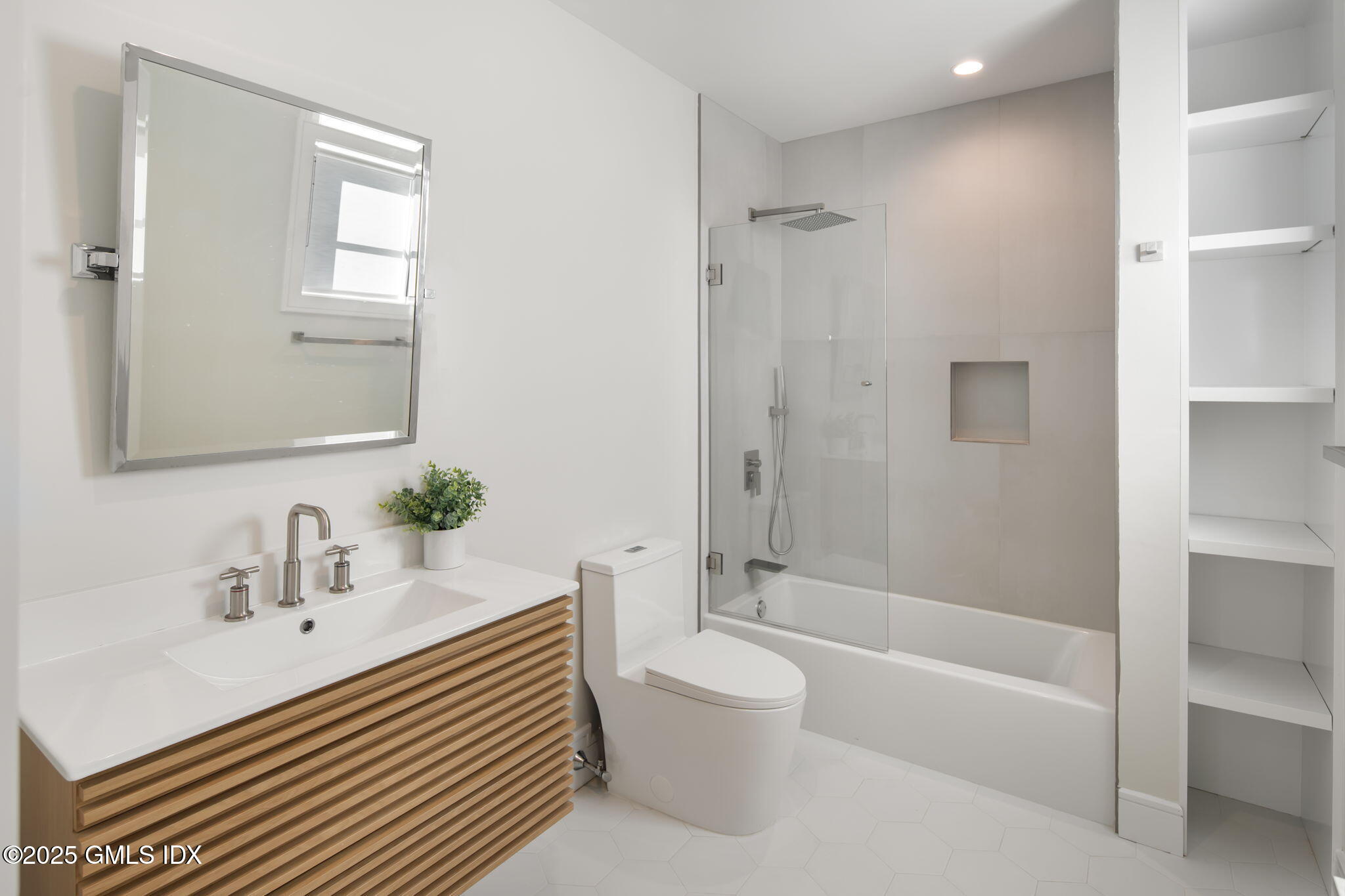 44 Amherst Road Old Greenwich, CT 06870 - Photo 29 of 39 a bathroom with a sink a toilet and shower