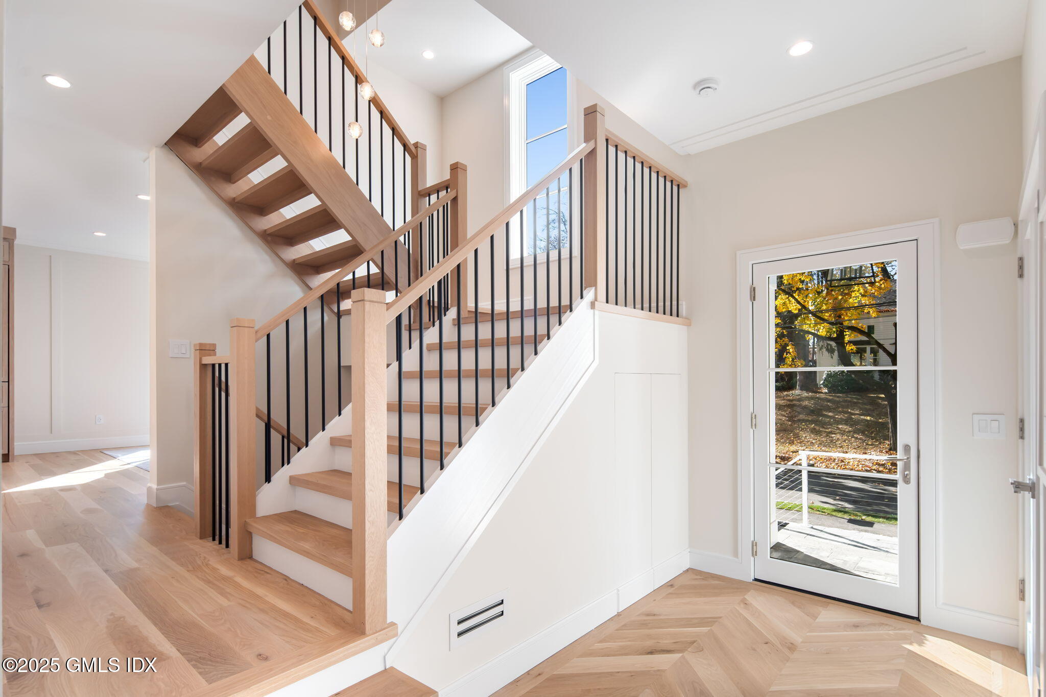 44 Amherst Road Old Greenwich, CT 06870 - Photo 5 of 39 a view of entryway and hall with wooden floor