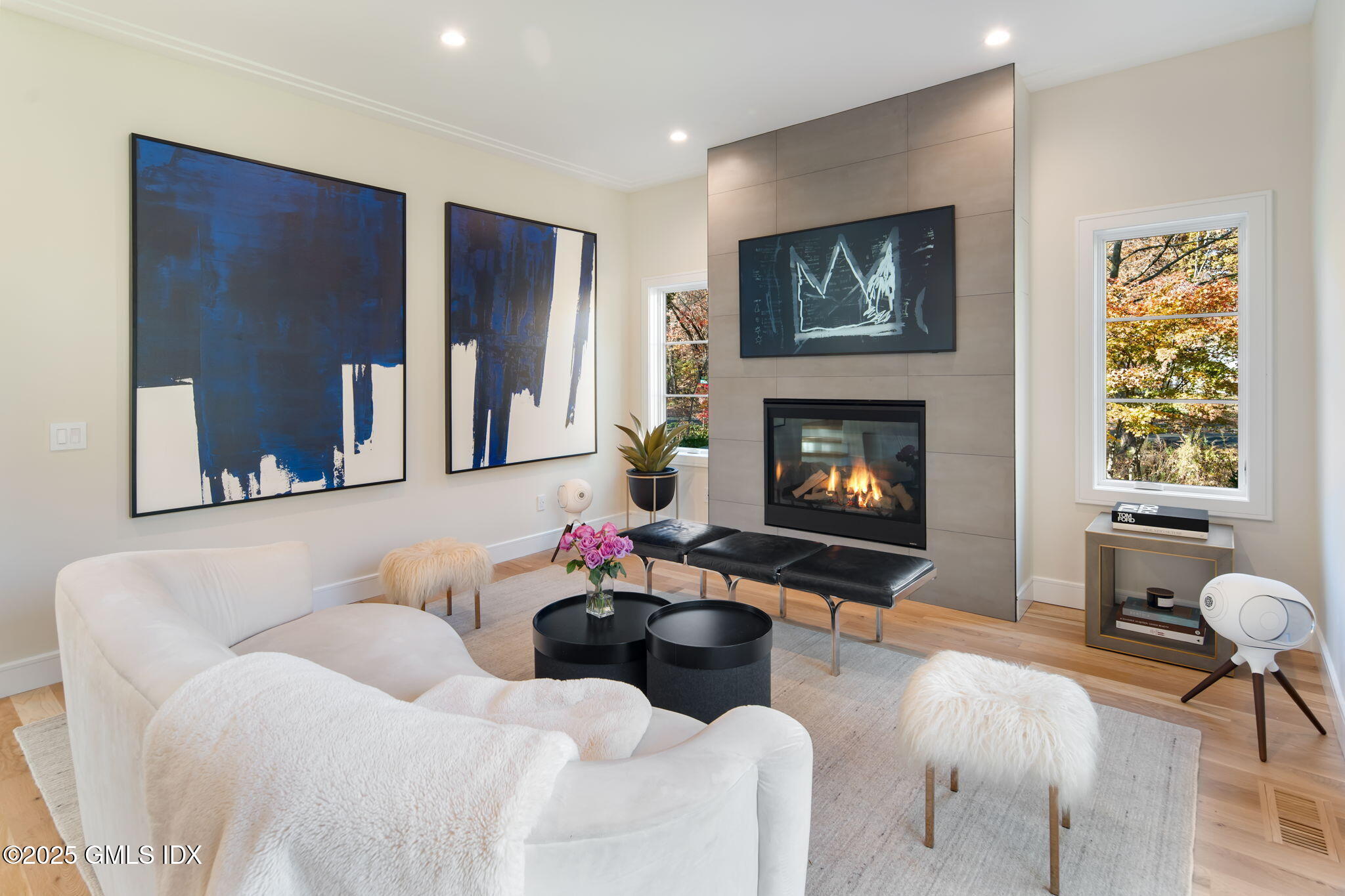44 Amherst Road Old Greenwich, CT 06870 - Photo 8 of 39 a living room with furniture fireplace and window