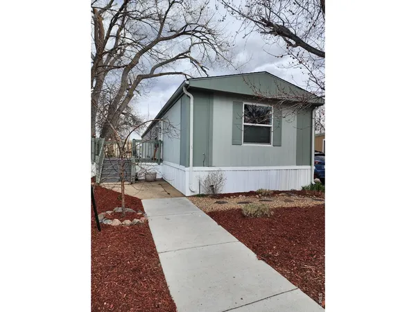 a front view of a house with yard