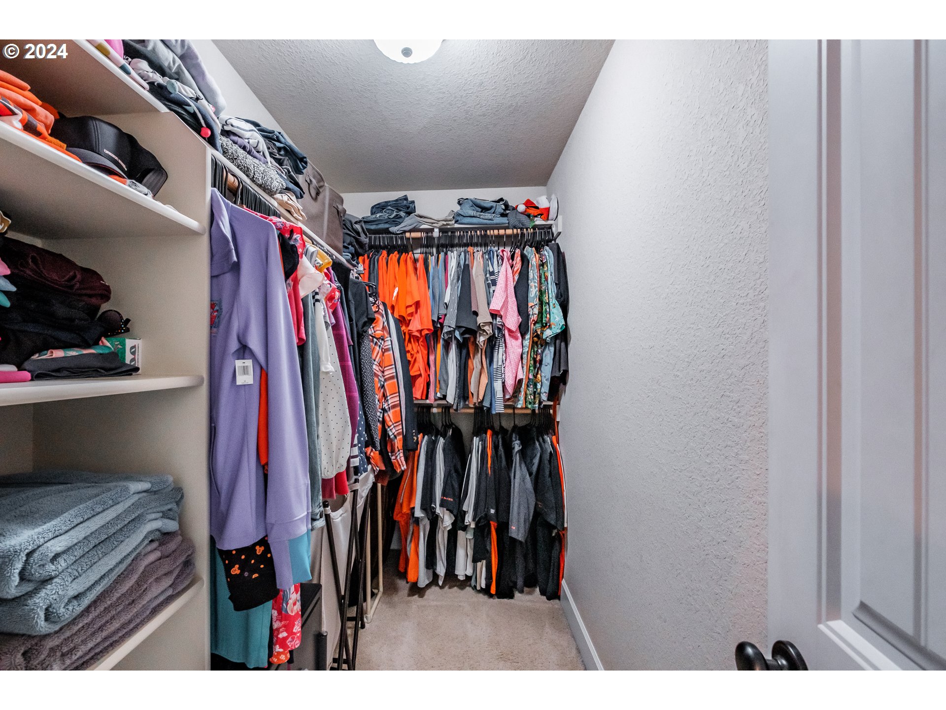323 Northwest Reed Lane Dallas, OR 97338 - Photo 25 of 40 a view of walk in closet with clothes