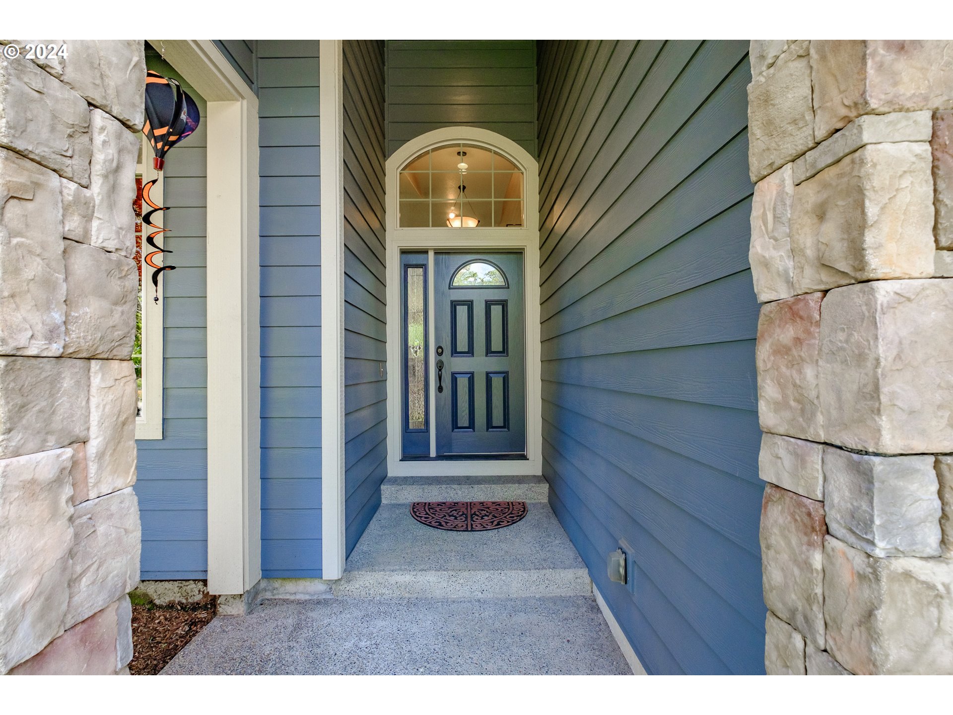 323 Northwest Reed Lane Dallas, OR 97338 - Photo 3 of 40 a view of a door of the house