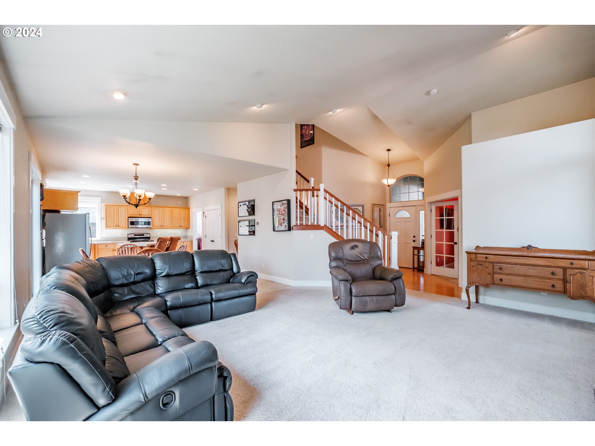 323 Northwest Reed Lane Dallas, OR 97338 - Photo 6 of 40 a living room with furniture and a couch