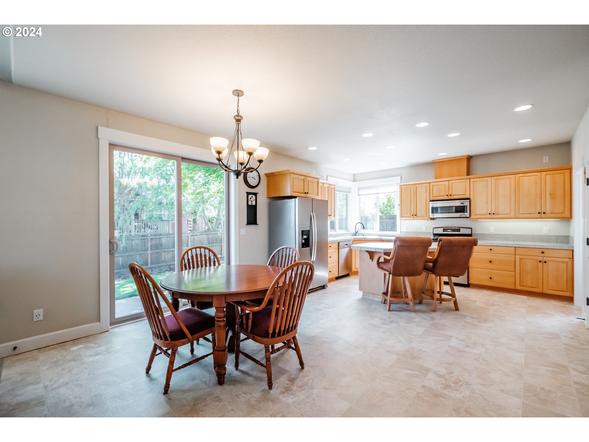 323 Northwest Reed Lane Dallas, OR 97338 - Photo 8 of 40 a view of a dining room with furniture window and outside view