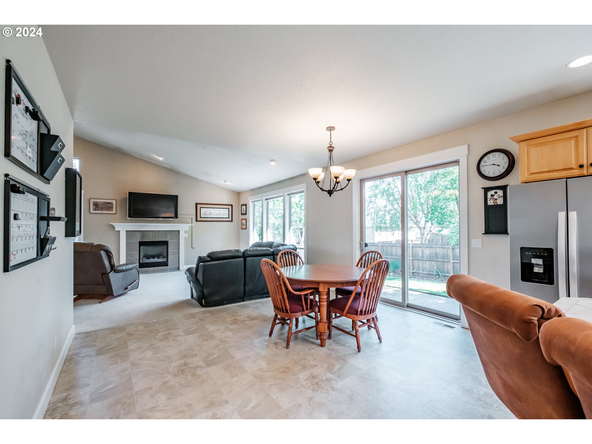 323 Northwest Reed Lane Dallas, OR 97338 - Photo 9 of 40 a view of a livingroom with furniture window and wooden floor
