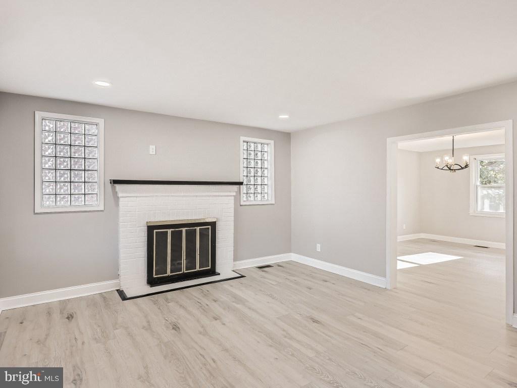 1913 Crestview Road Baltimore, MD 21239 - Photo 5 of 26 Living Room with Fireplace