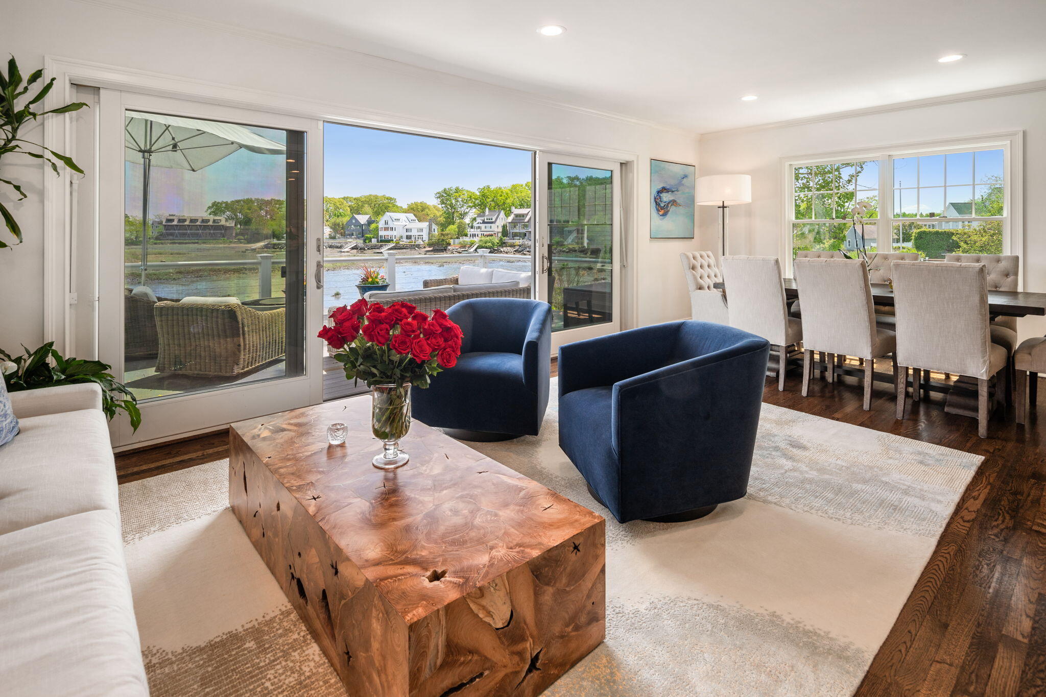 69 Roton Avenue Rowayton, CT 06853 - Photo 11 of 31 a living room with furniture potted plant and a large window