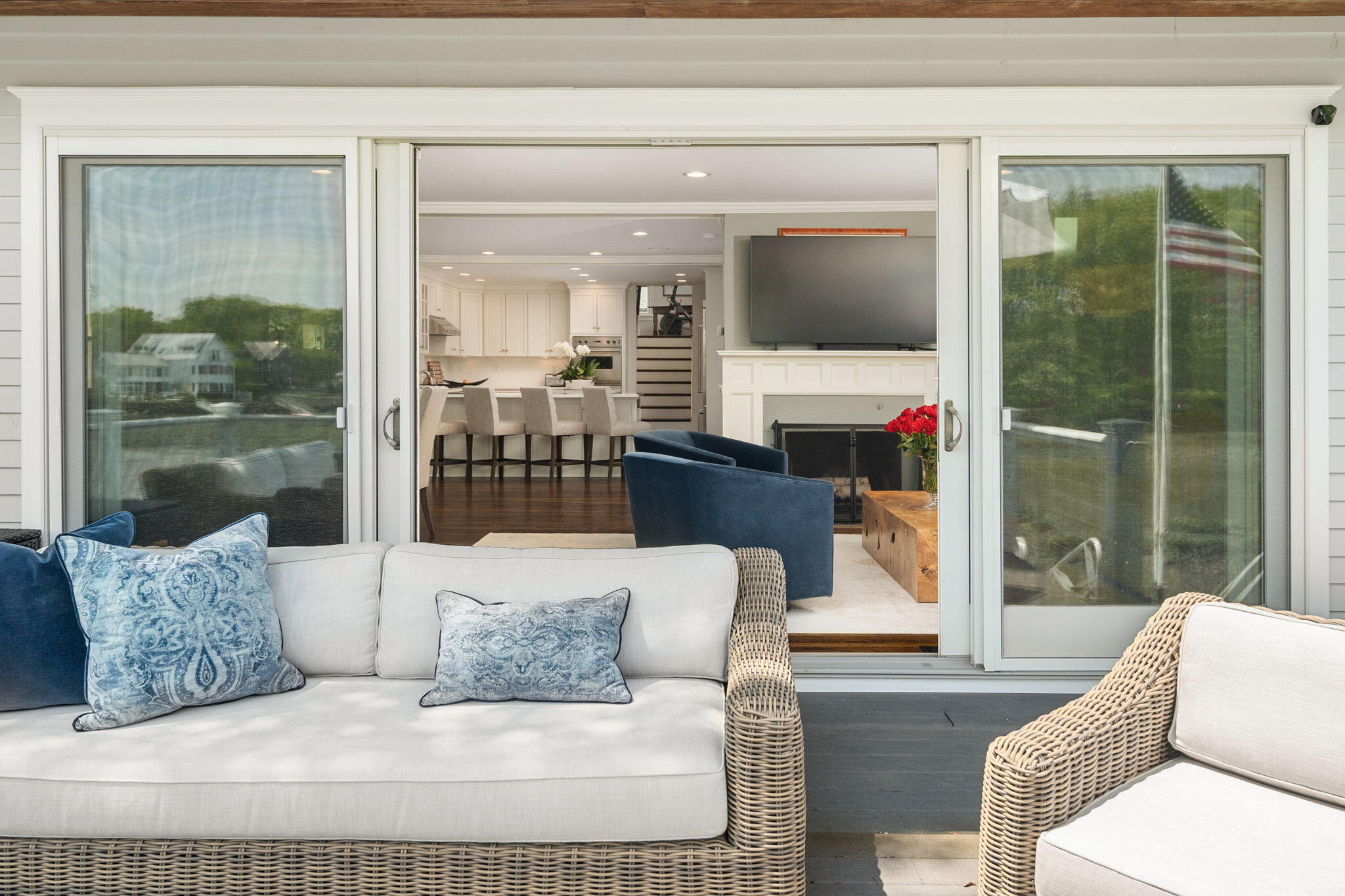 69 Roton Avenue Rowayton, CT 06853 - Photo 13 of 31 a living room with a large window and a flat screen tv