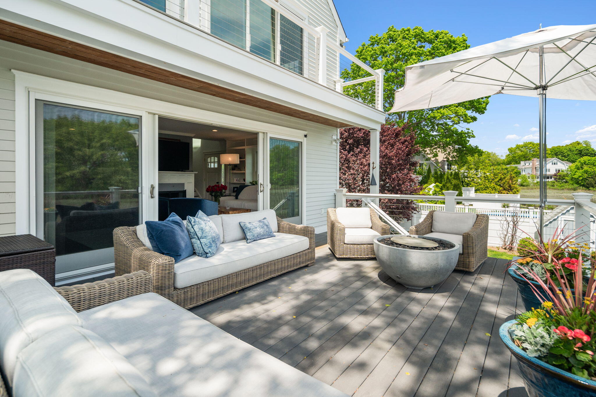 69 Roton Avenue Rowayton, CT 06853 - Photo 14 of 31 a view of a patio with couches and potted plants