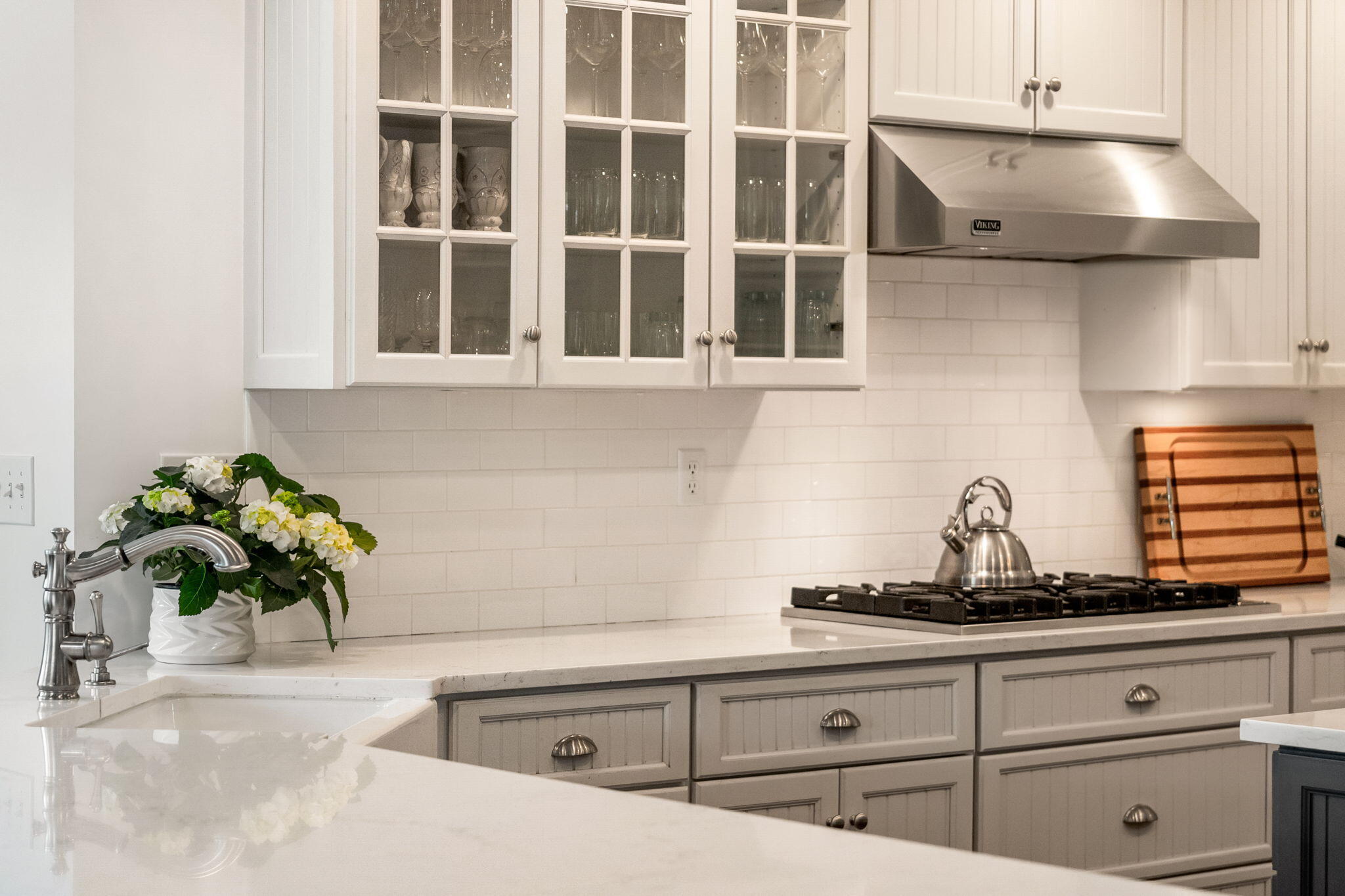 69 Roton Avenue Rowayton, CT 06853 - Photo 20 of 31 a white kitchen with a sink and cabinets
