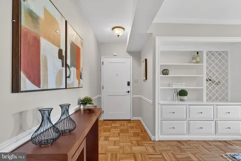 a bedroom with a bed and a cabinets