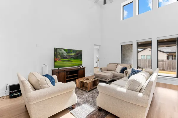 a view of an entryway with wooden floor and door
