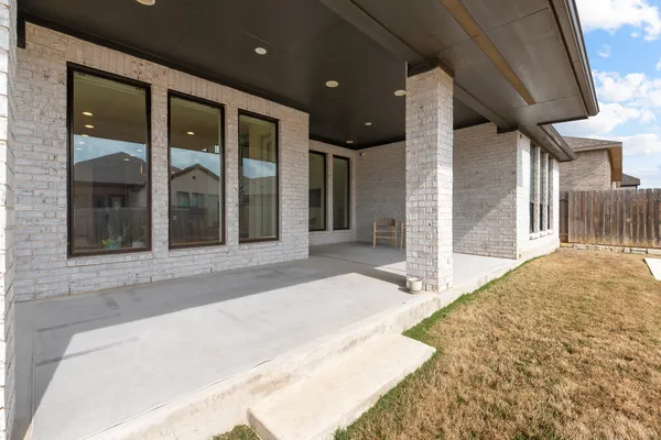 a view of a building with a glass door