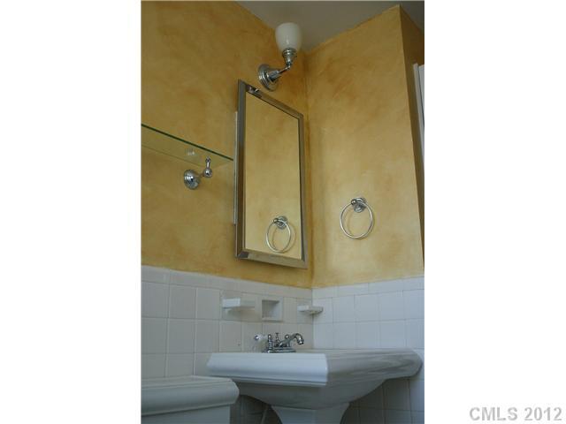 2408 Providence Road, Unit 1 Charlotte, NC 28211 - Photo 7 of 7 a bathroom with a sink and mirror