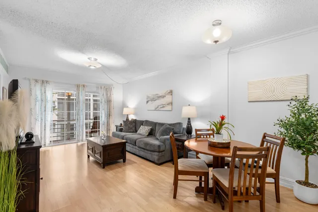 a living room with furniture and a table