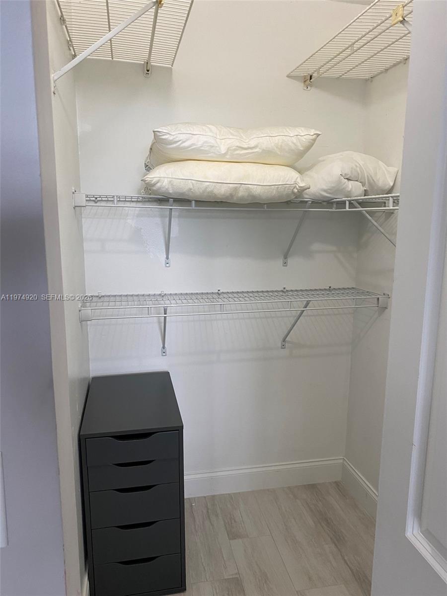 2929 South Ocean Boulevard, Unit 5090 Boca Raton, FL 33432 - Photo 16 of 25 a close view of walk in closet