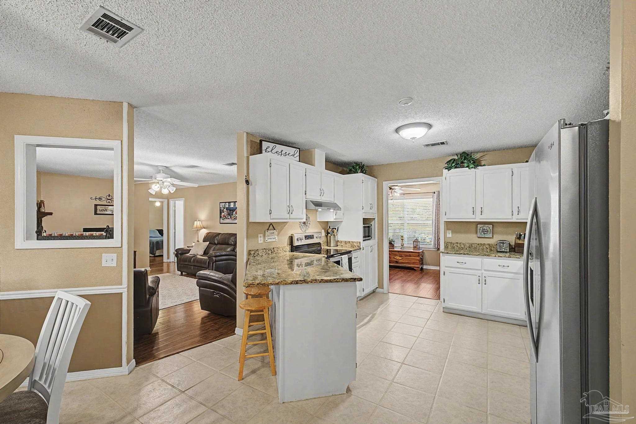 5601 Windermere Trace Pace, FL 32571 - Photo 14 of 69