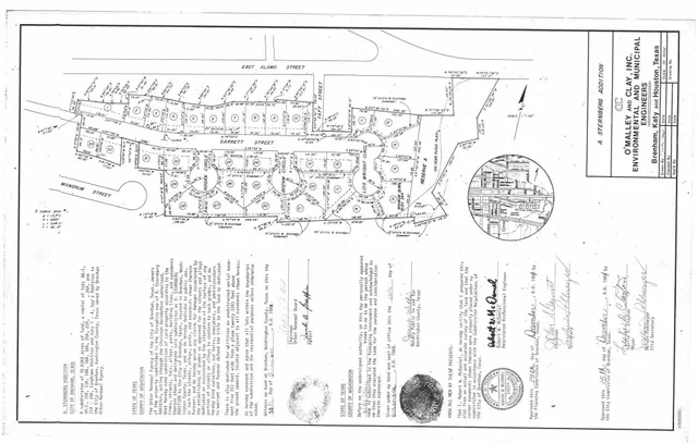 a picture of a bathroom with a shower curtain and a large mirror