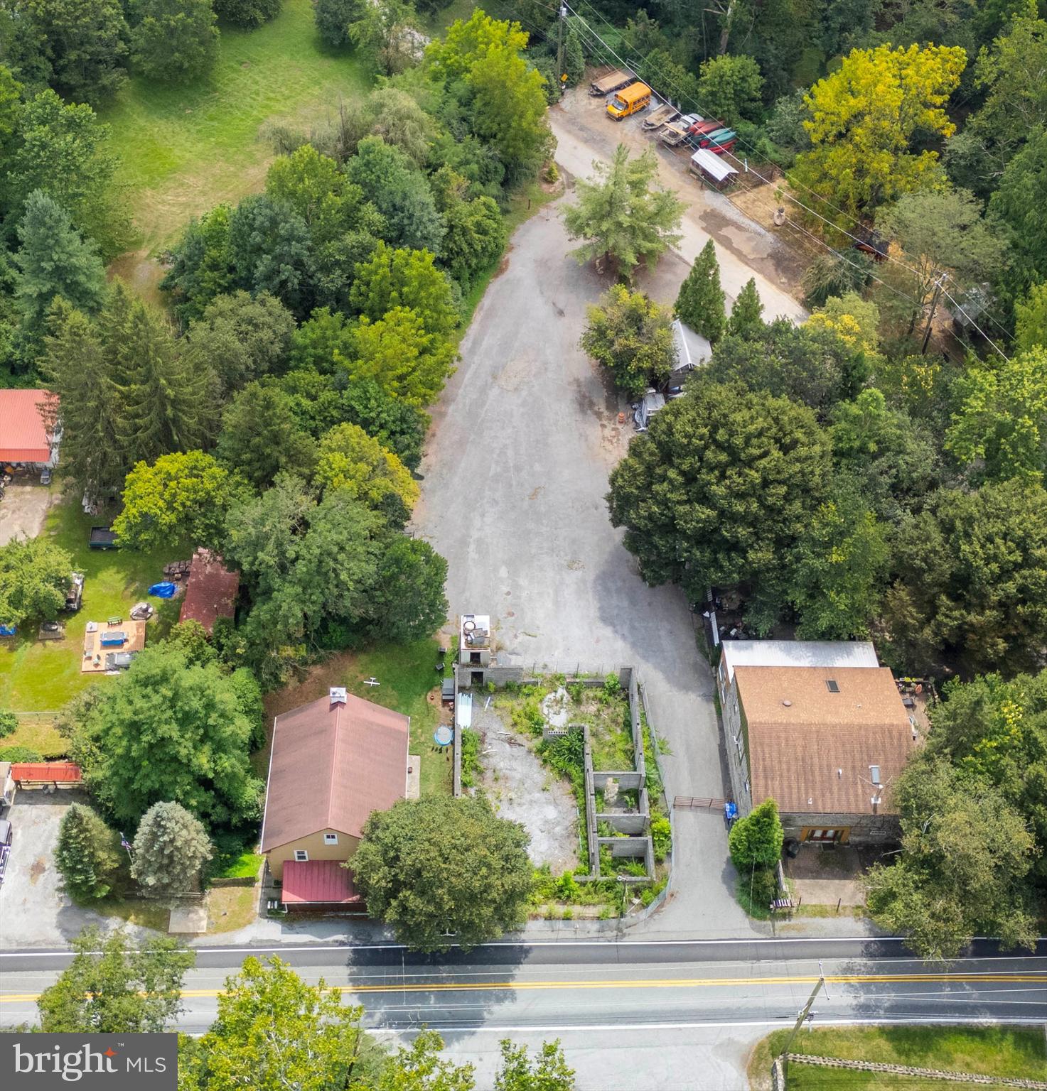 2090 Strasburg Road Coatesville, PA 19320 - Photo 11 of 13 an aerial view of a house with yard swimming pool and outdoor seating