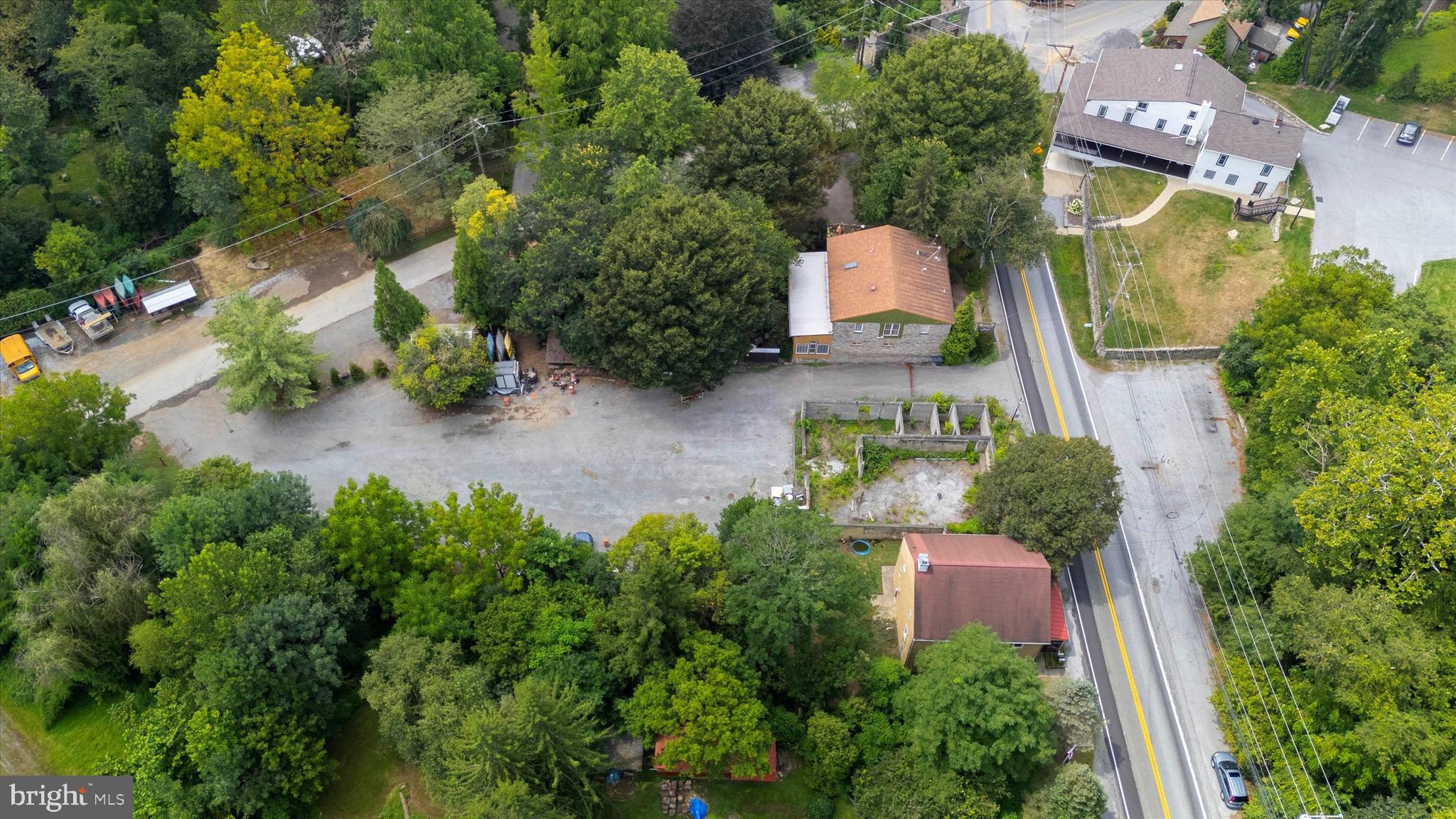 2090 Strasburg Road Coatesville, PA 19320 - Photo 6 of 13 an aerial view of a house with a yard and garden