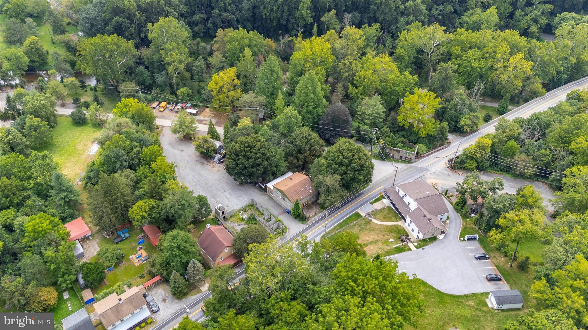 2090 Strasburg Road Coatesville, PA 19320 - Photo 10 of 13 an aerial view of a house with a yard and lake view