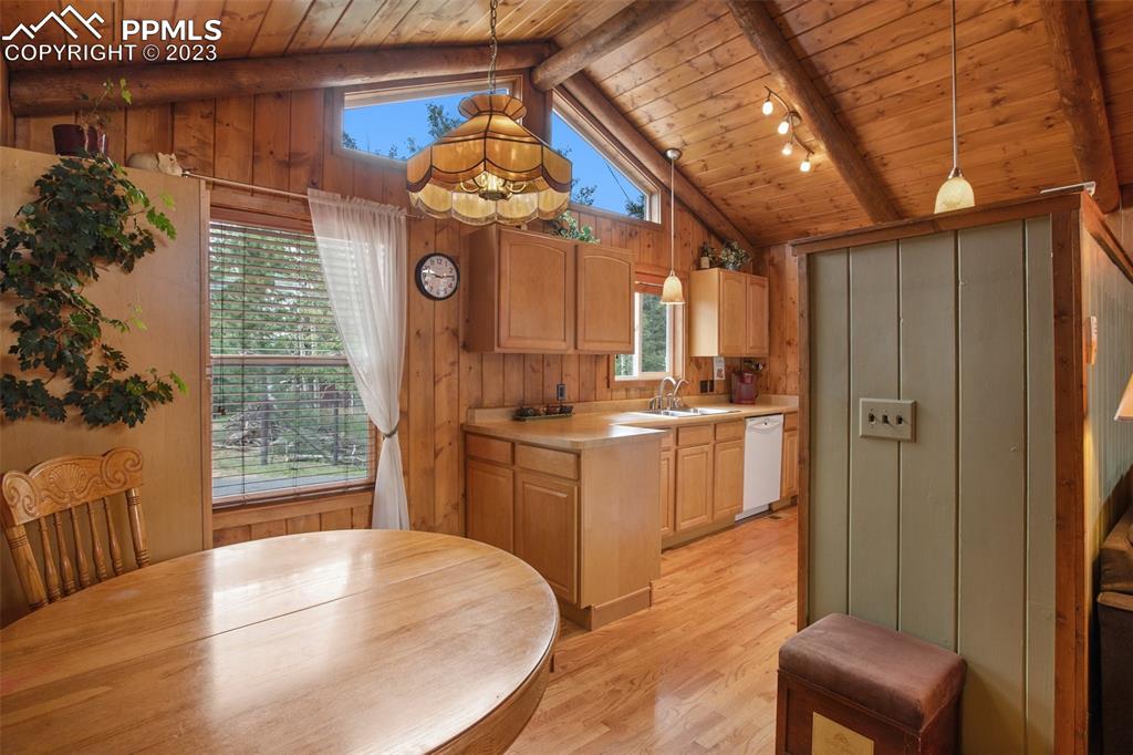 321 Dewell Road Woodland Park, CO 80863 - Photo 16 of 32 a kitchen with a refrigerator and a stove