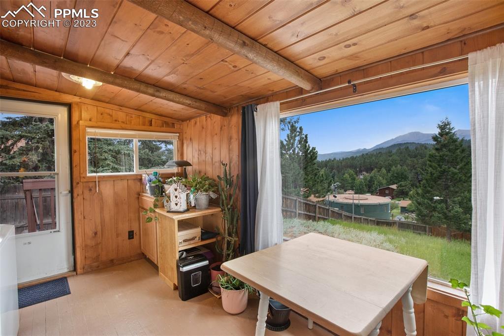 321 Dewell Road Woodland Park, CO 80863 - Photo 20 of 32 a view of a chairs and table in a patio